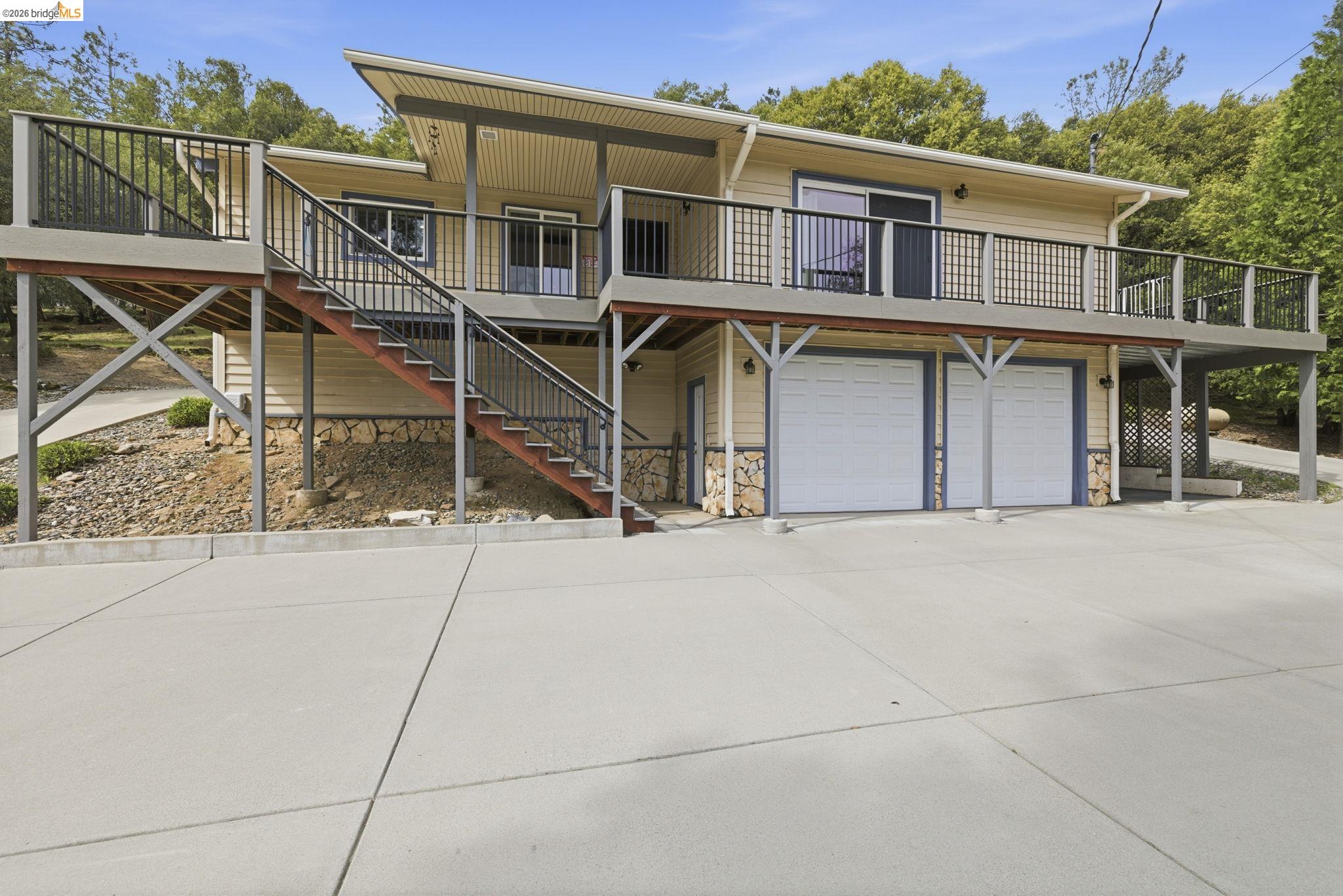 21955 Fallview Drive Sonora, CA 95370 - Photo 2 of 32 front view of a house with a street