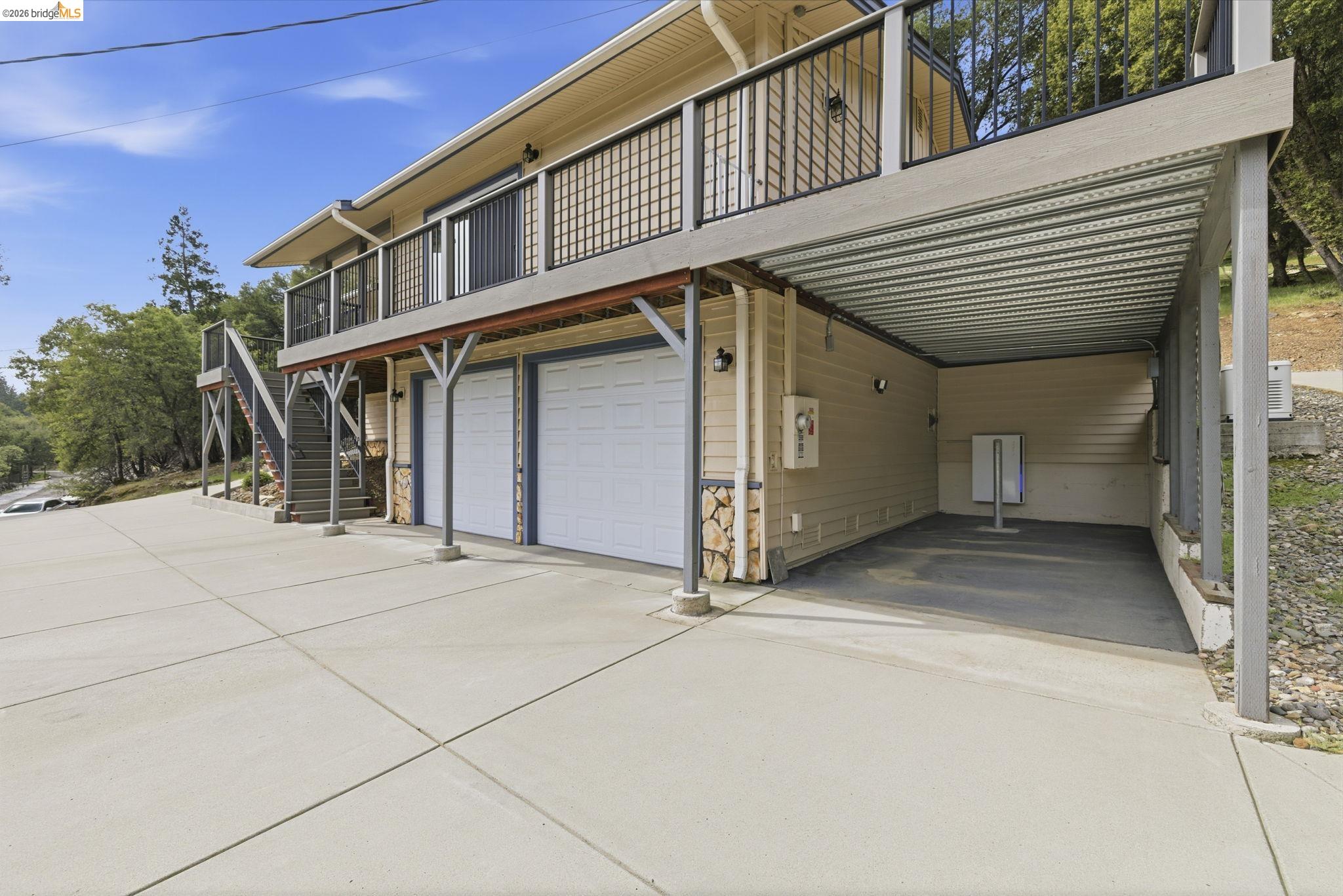 21955 Fallview Drive Sonora, CA 95370 - Photo 24 of 32 a view of a house with a garage