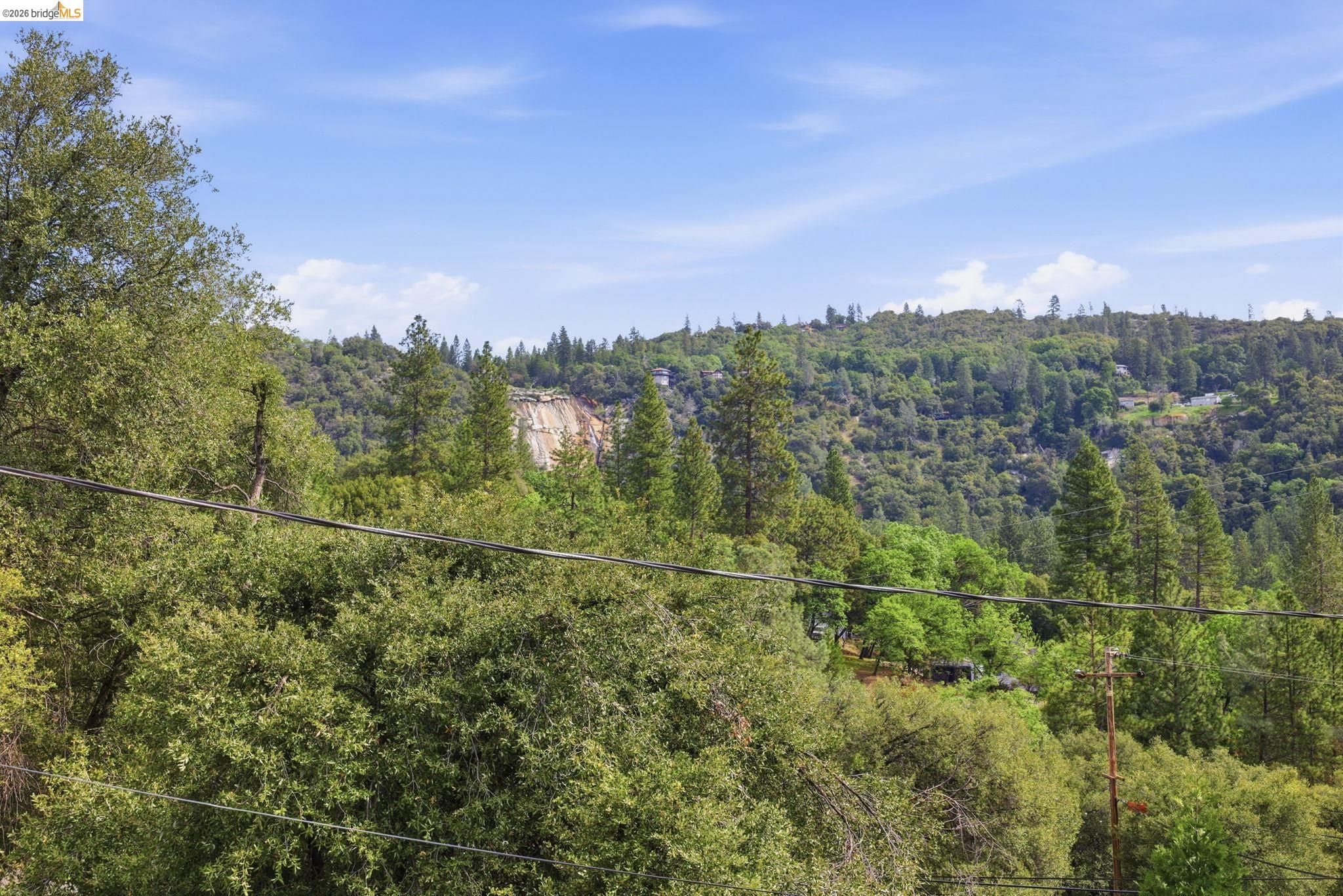 21955 Fallview Drive Sonora, CA 95370 - Photo 27 of 32 a view of a field with a tree in the background