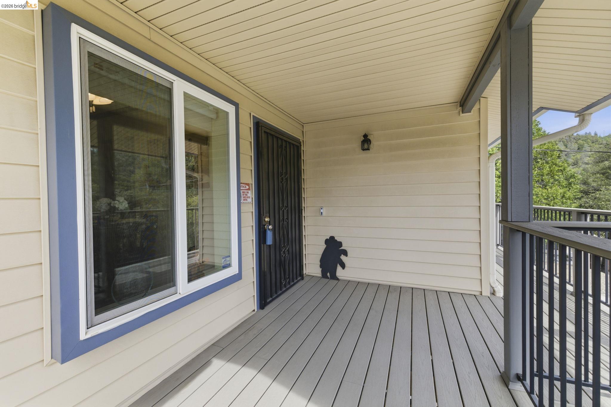 21955 Fallview Drive Sonora, CA 95370 - Photo 3 of 32 a view of a balcony with wooden floor and floor