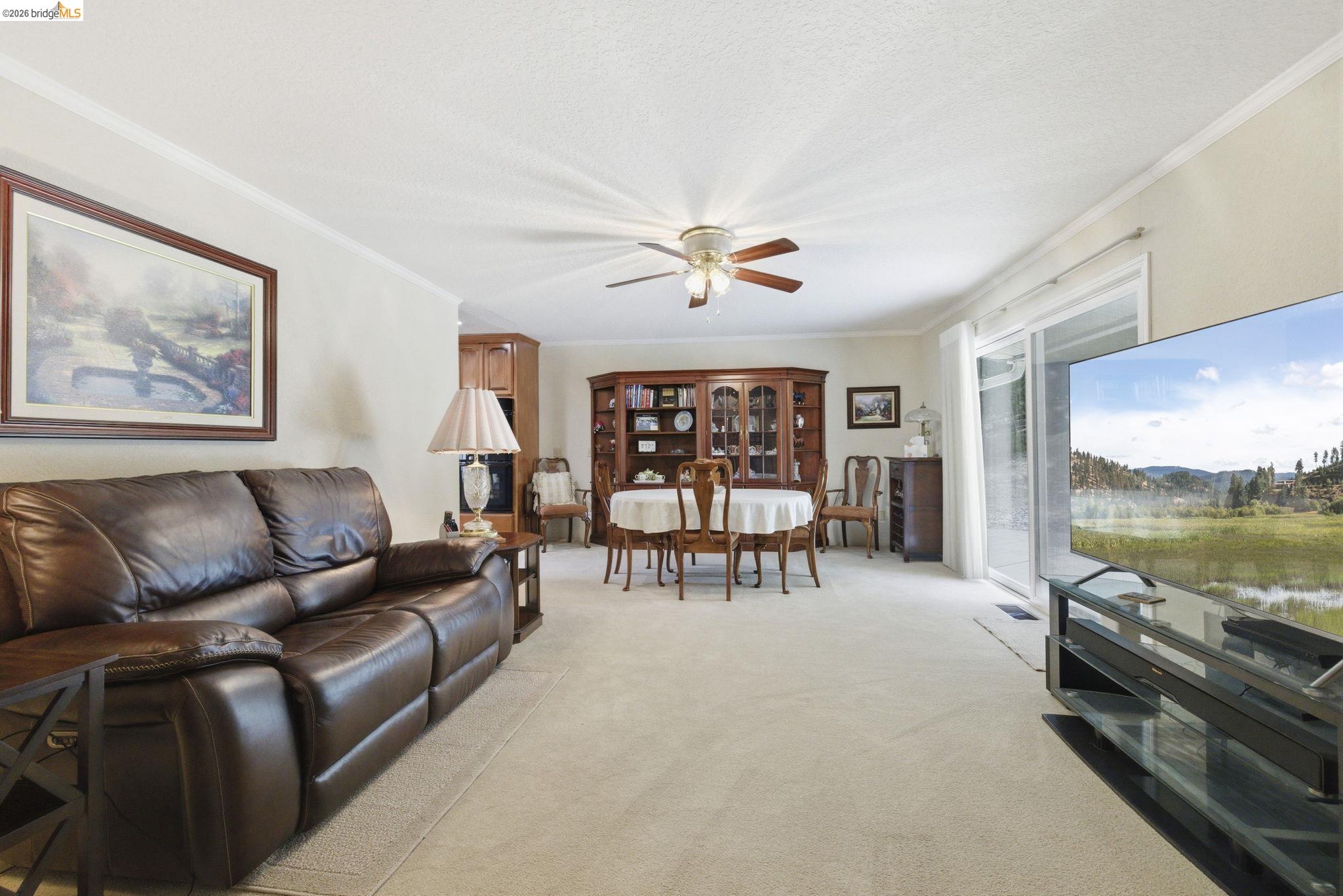 21955 Fallview Drive Sonora, CA 95370 - Photo 6 of 32 a living room with furniture and a large window