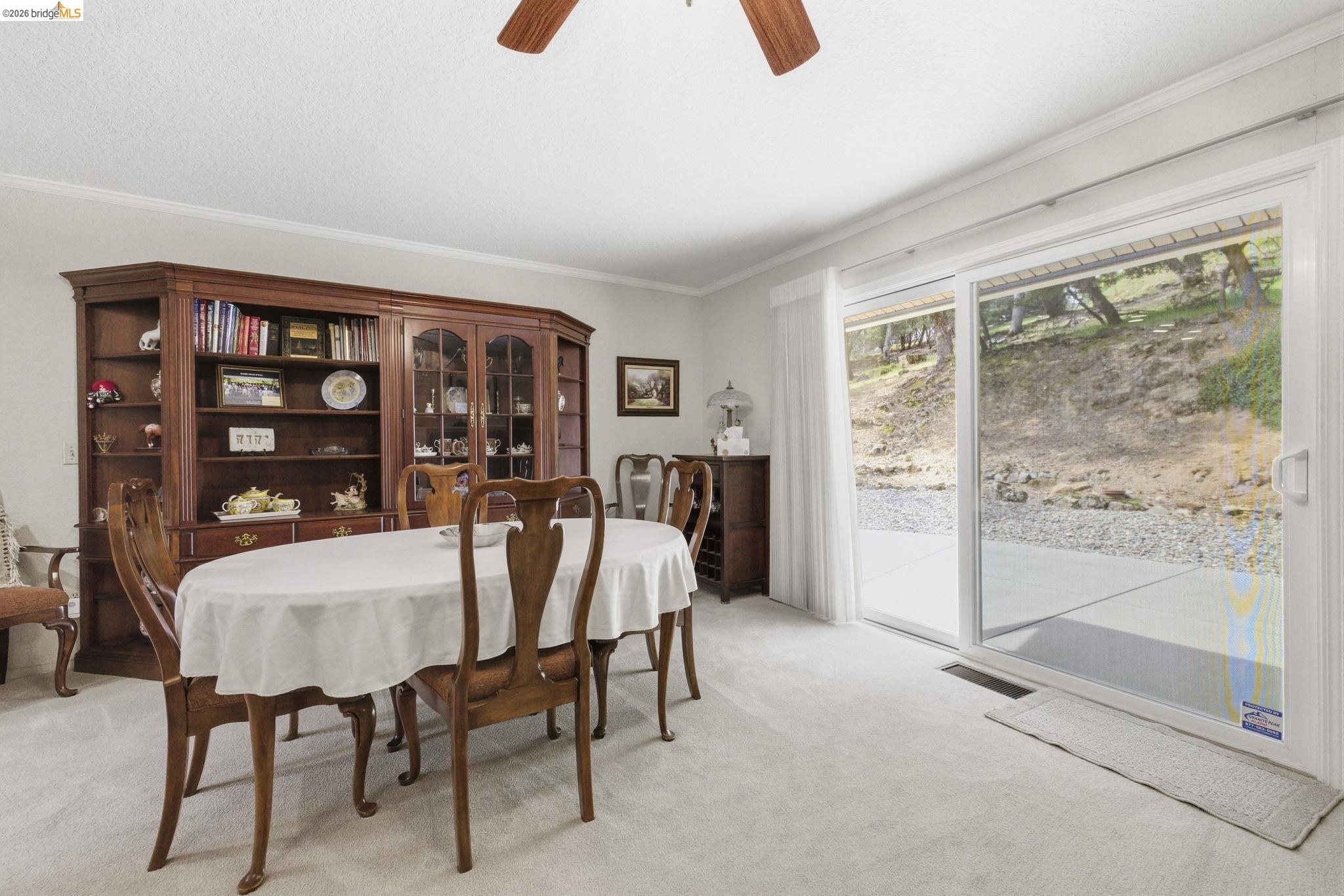 21955 Fallview Drive Sonora, CA 95370 - Photo 7 of 32 a view of a dining room with furniture window and outside view