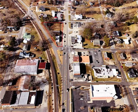an aerial view of a building with outdoor space