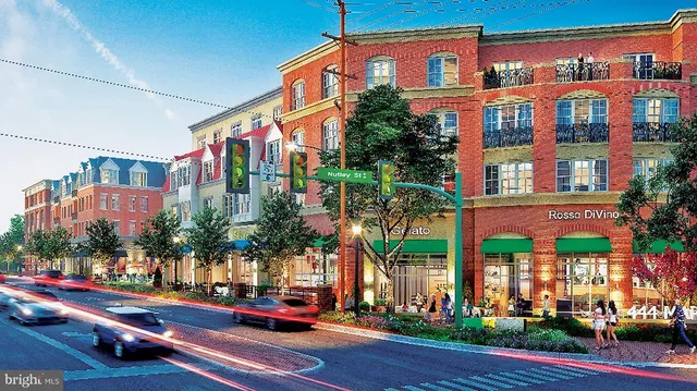 an outdoor space with seating area and potted plants