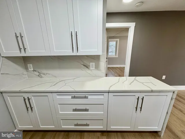 a kitchen with a stove and a microwave