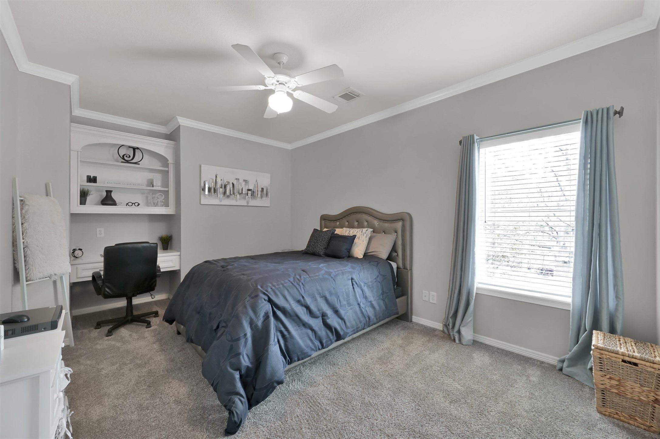 9706 Chipstead Court Spring, TX 77379 - Photo 32 of 44 Introducing secondary bedroom number 1 with a built in desk and plenty of room for activities, creativity, or relaxation.