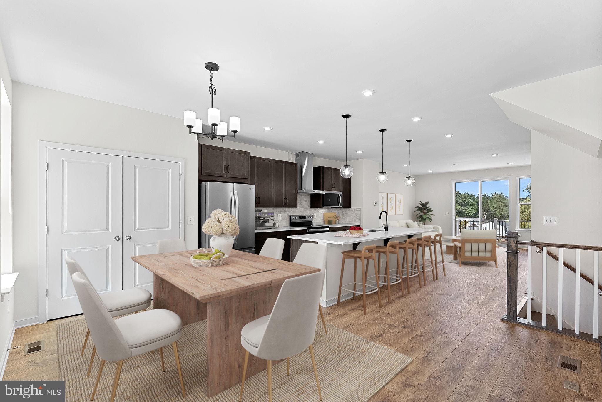 4151 Mountjoy Way Dumfries, VA 22026 - Photo 13 of 41 a view of kitchen with dining table and chairs