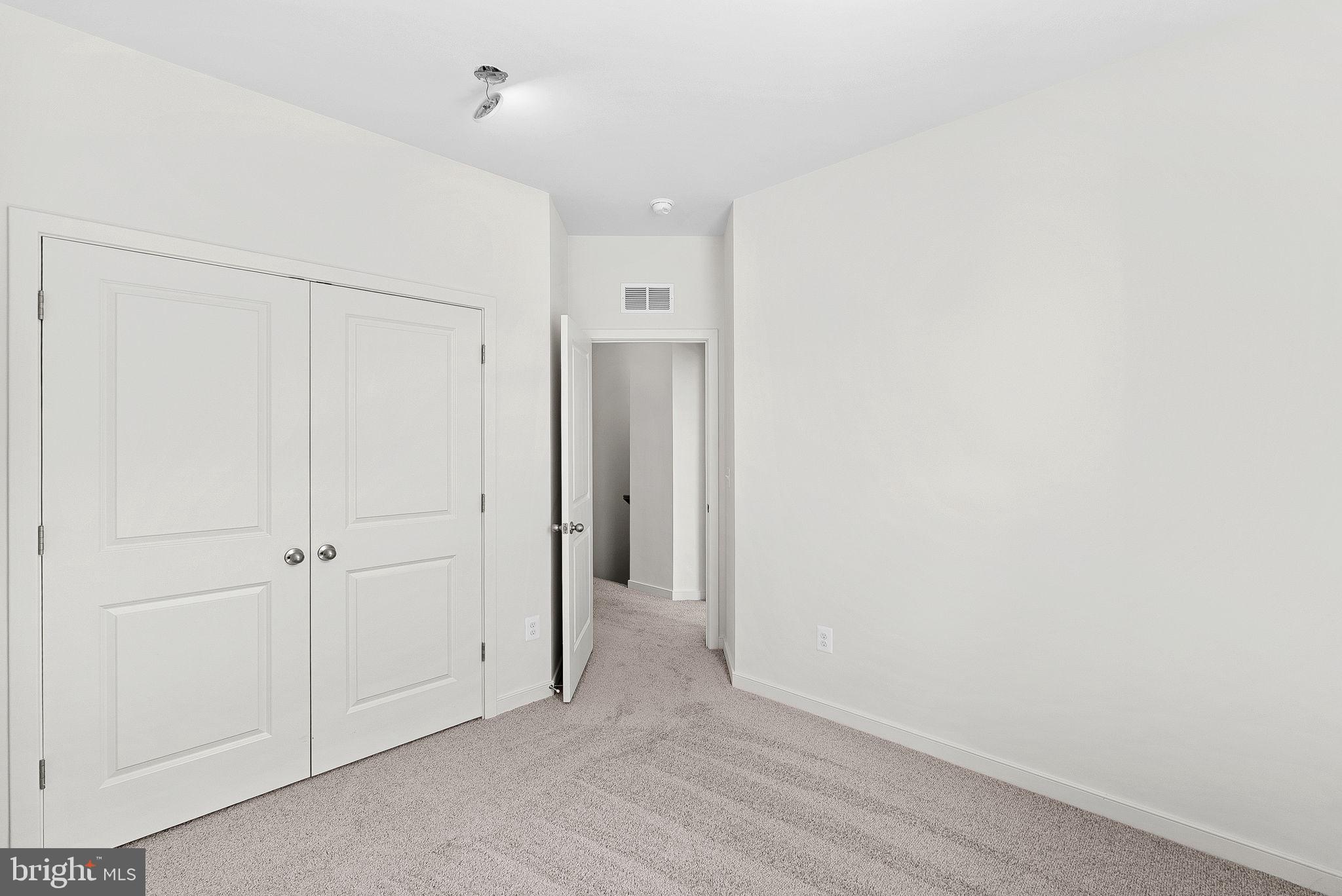 4151 Mountjoy Way Dumfries, VA 22026 - Photo 19 of 41 a view of an empty room