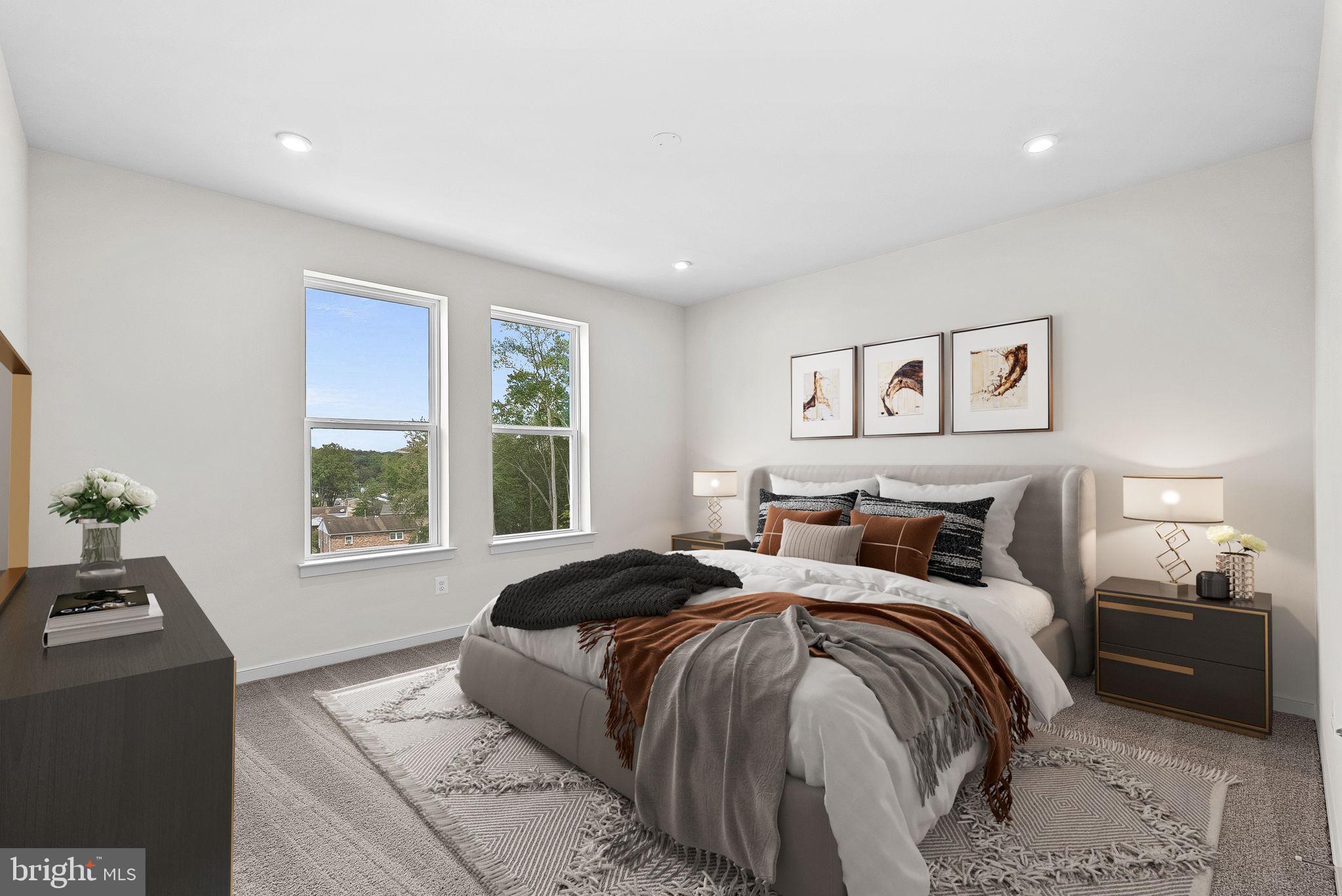 4151 Mountjoy Way Dumfries, VA 22026 - Photo 22 of 41 a bedroom with a bed and a tv