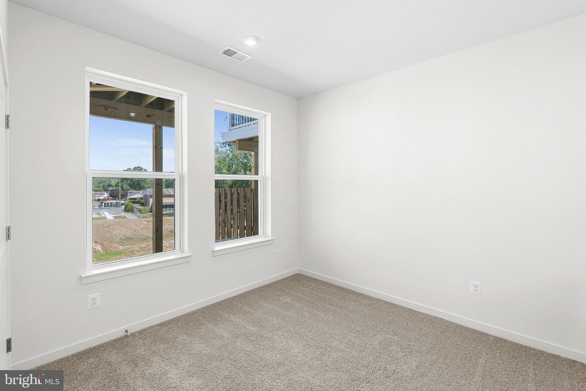 4151 Mountjoy Way Dumfries, VA 22026 - Photo 4 of 41 an empty room with a window