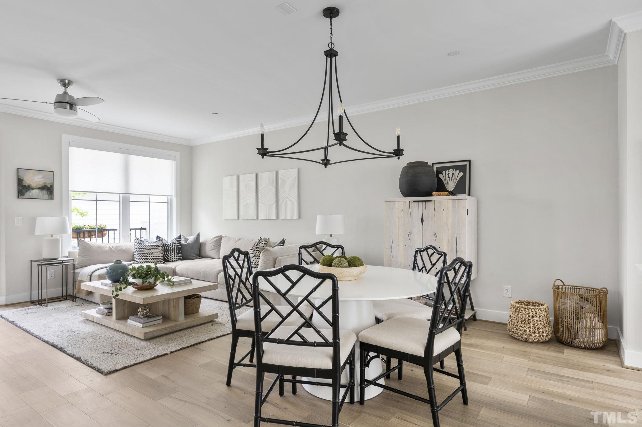 1610 Draper View Loop, Unit 104 Raleigh, NC 27608 - Photo 17 of 41 a dining room with furniture and window