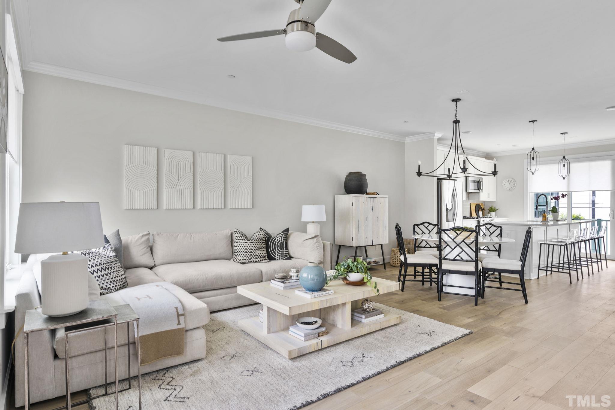 1610 Draper View Loop, Unit 104 Raleigh, NC 27608 - Photo 21 of 41 a living room with furniture and wooden floor
