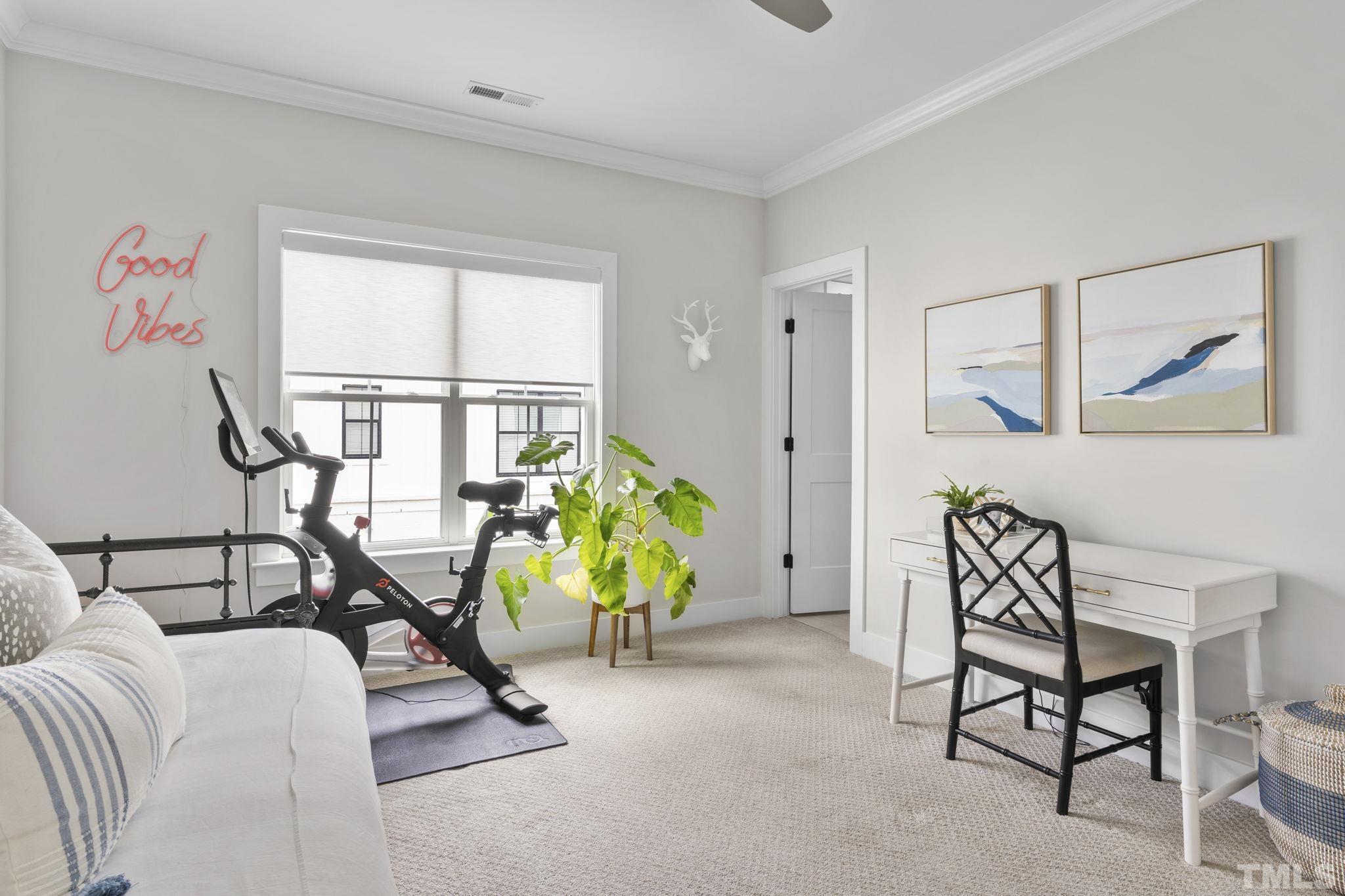 1610 Draper View Loop, Unit 104 Raleigh, NC 27608 - Photo 29 of 41 a view of a livingroom with furniture and a window