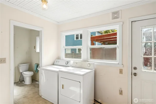 a bathroom with a sink toilet and mirror