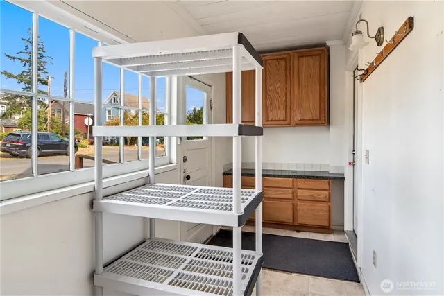 a balcony view with a rug