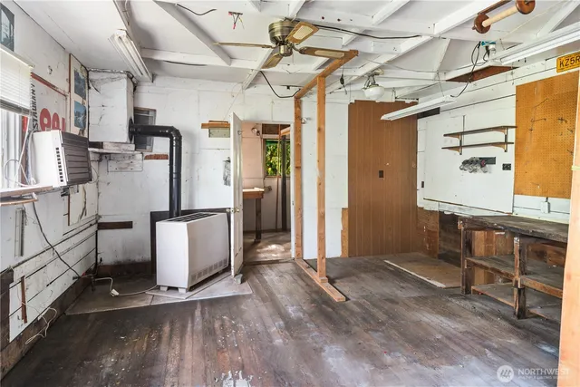 a view of a house with a tree