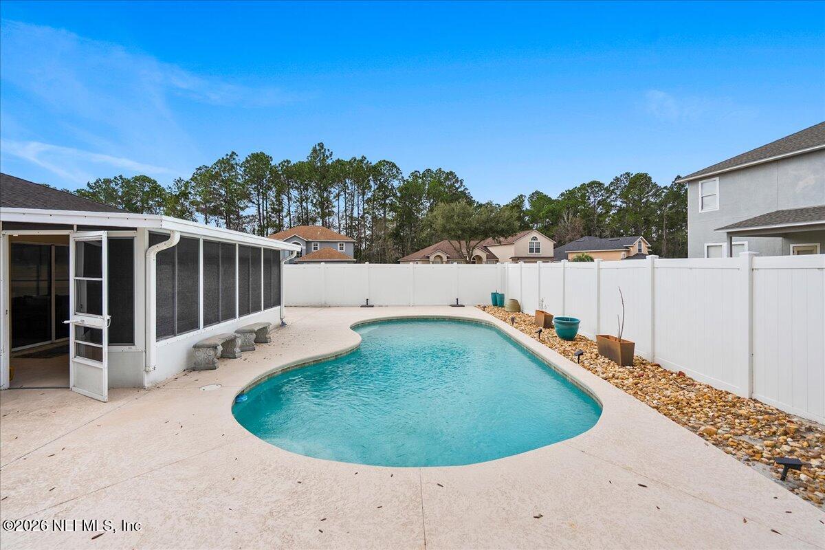 10310 Woodley Point Road Jacksonville, FL 32218 - Photo 23 of 30 a view of outdoor space and yard