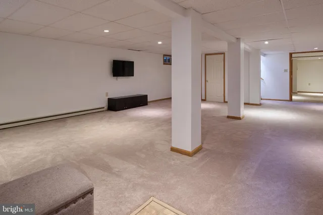 a bedroom with a bed and furniture