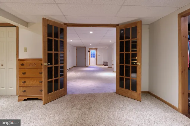 a utility room with sink dryer and washer