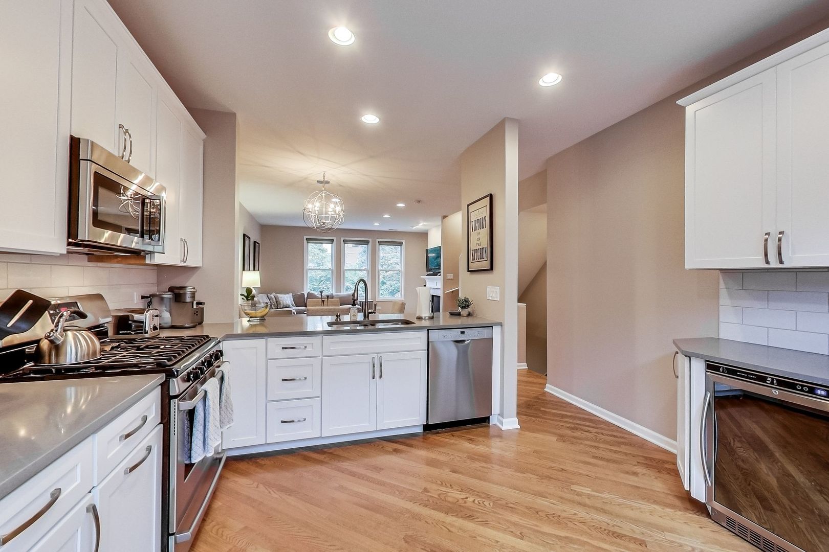 640 West Oak Street Chicago, IL 60610 - Photo 18 of 43 a kitchen with granite countertop a stove top oven and sink