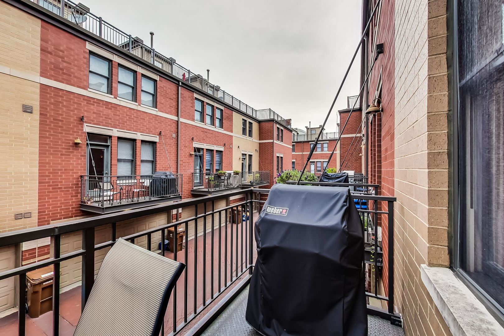 640 West Oak Street Chicago, IL 60610 - Photo 20 of 43 a view of a brick building from a balcony