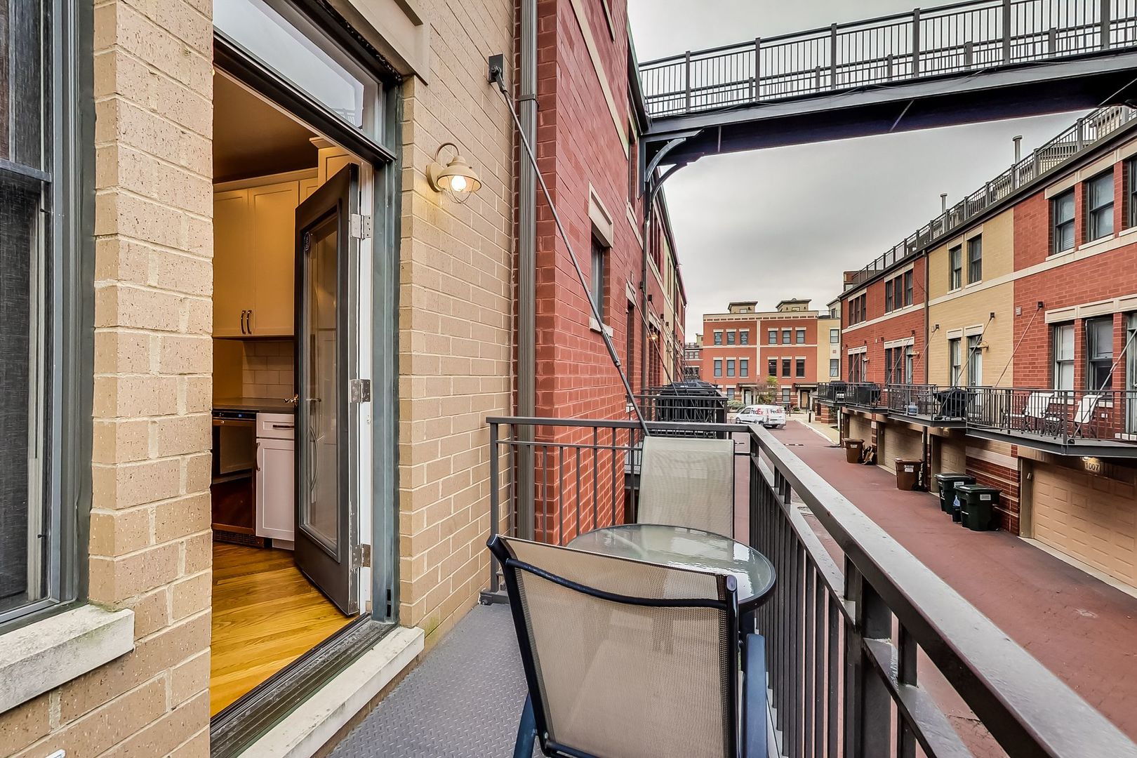 640 West Oak Street Chicago, IL 60610 - Photo 21 of 43 a view of a patio with wooden chairs