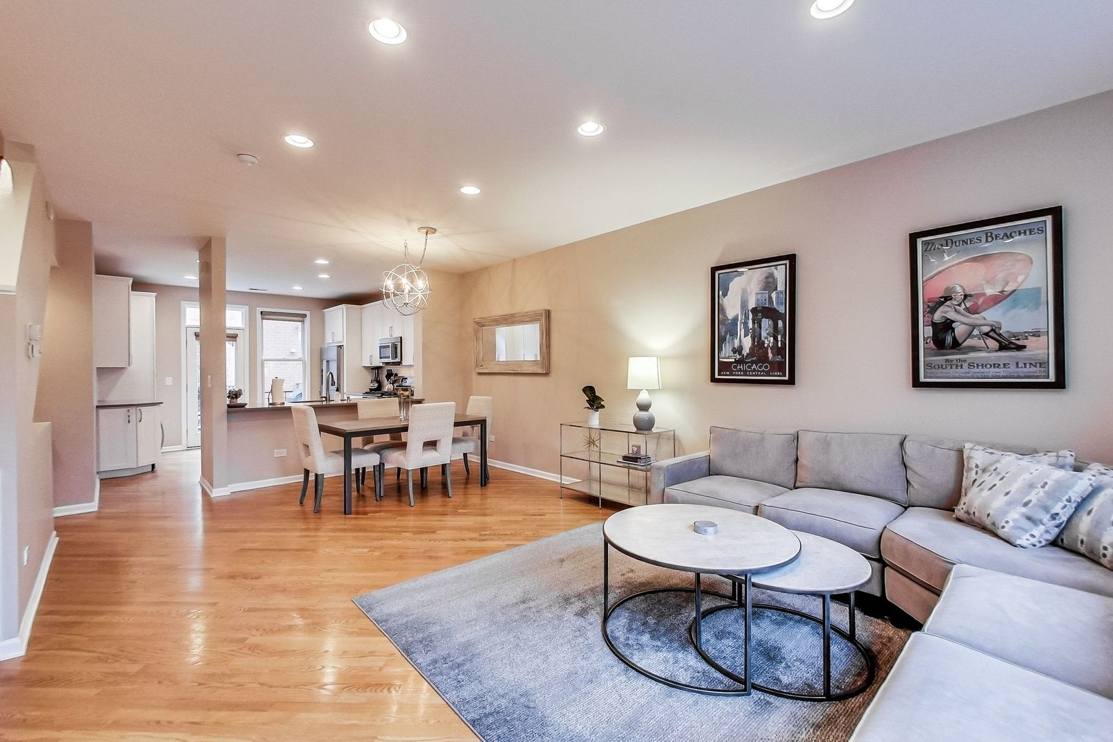 640 West Oak Street Chicago, IL 60610 - Photo 24 of 43 a living room with furniture a dining table and kitchen view