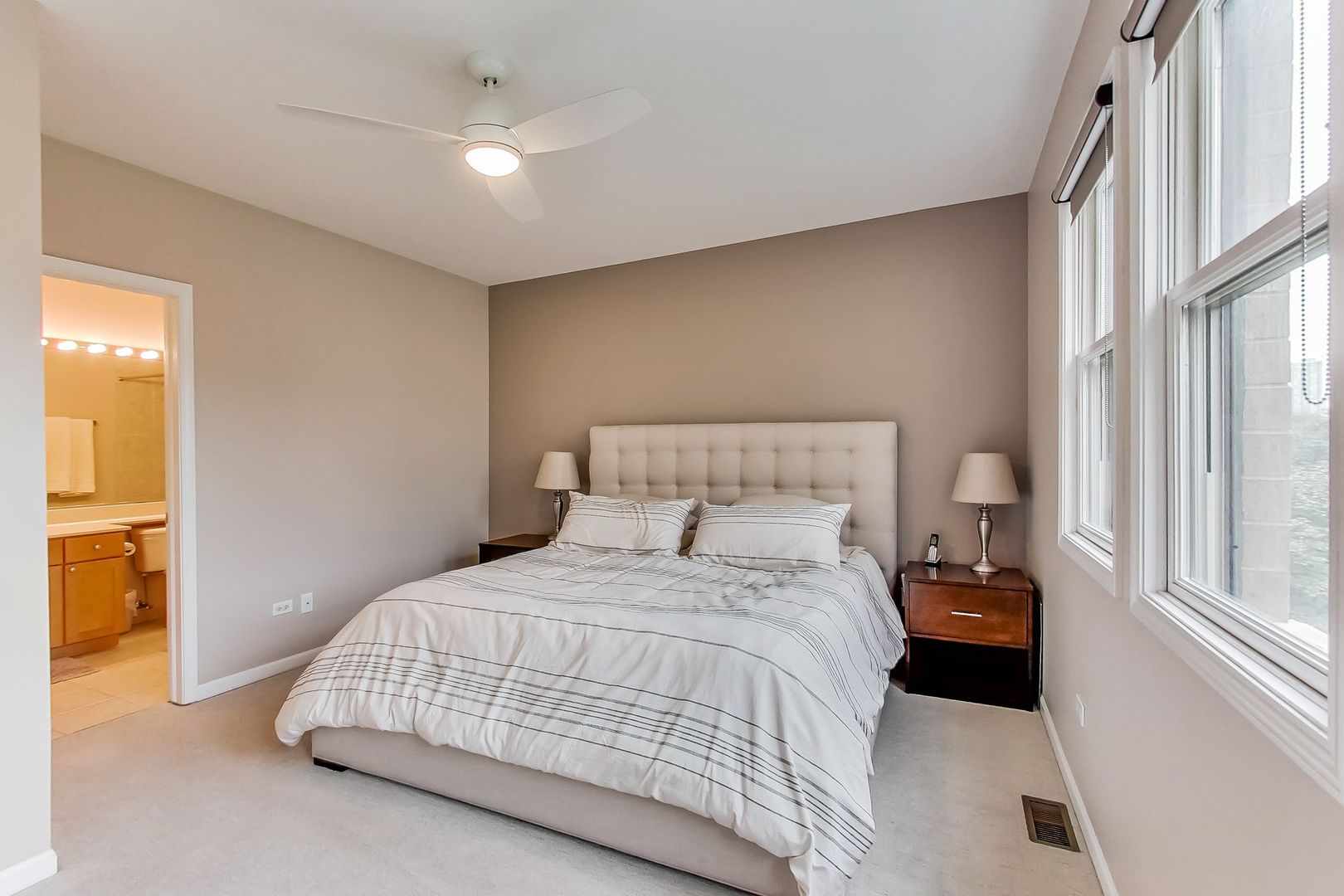 640 West Oak Street Chicago, IL 60610 - Photo 29 of 43 a bedroom with a bed and a window