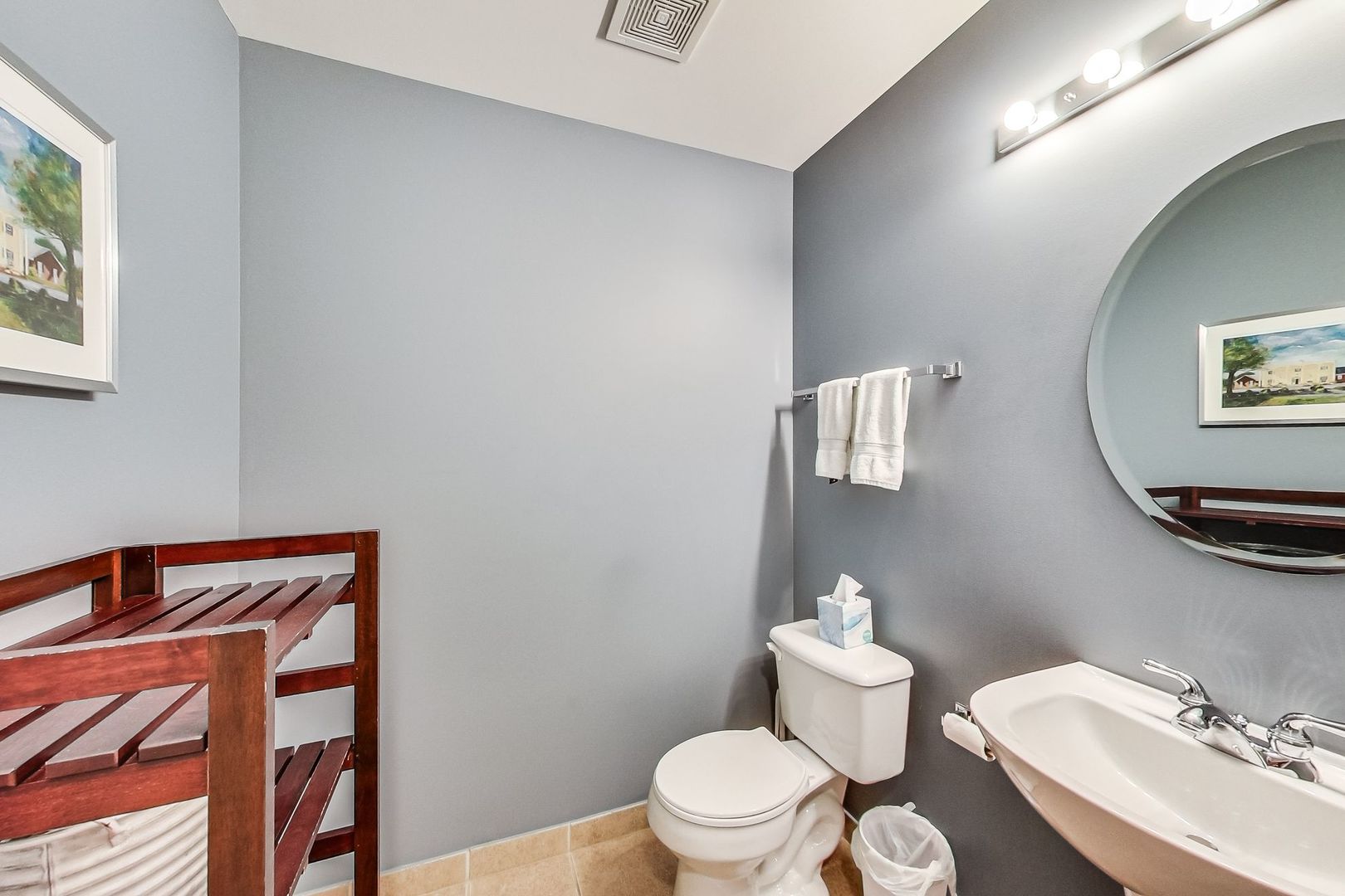 640 West Oak Street Chicago, IL 60610 - Photo 10 of 43 a white toilet sitting next to a bathroom sink