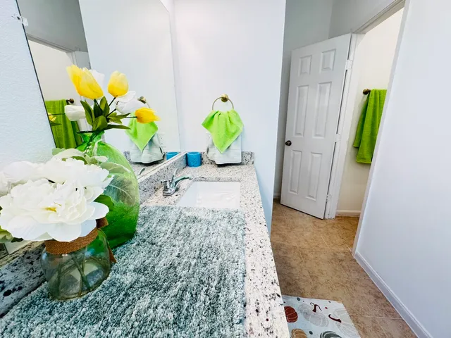 a view of living room with wooden floor