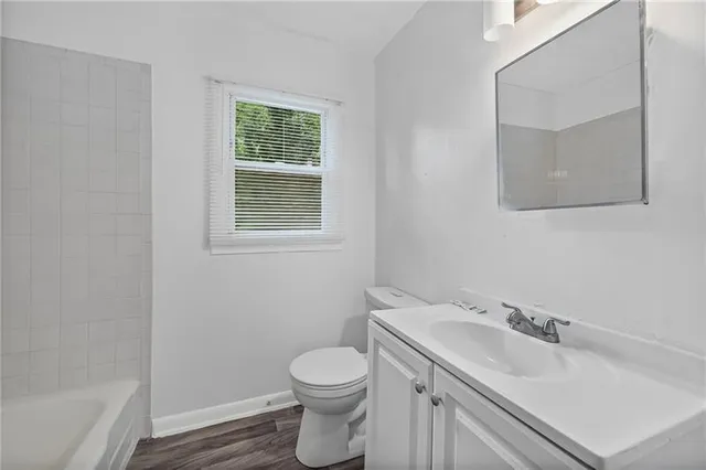a bathroom with a sink and a toilet