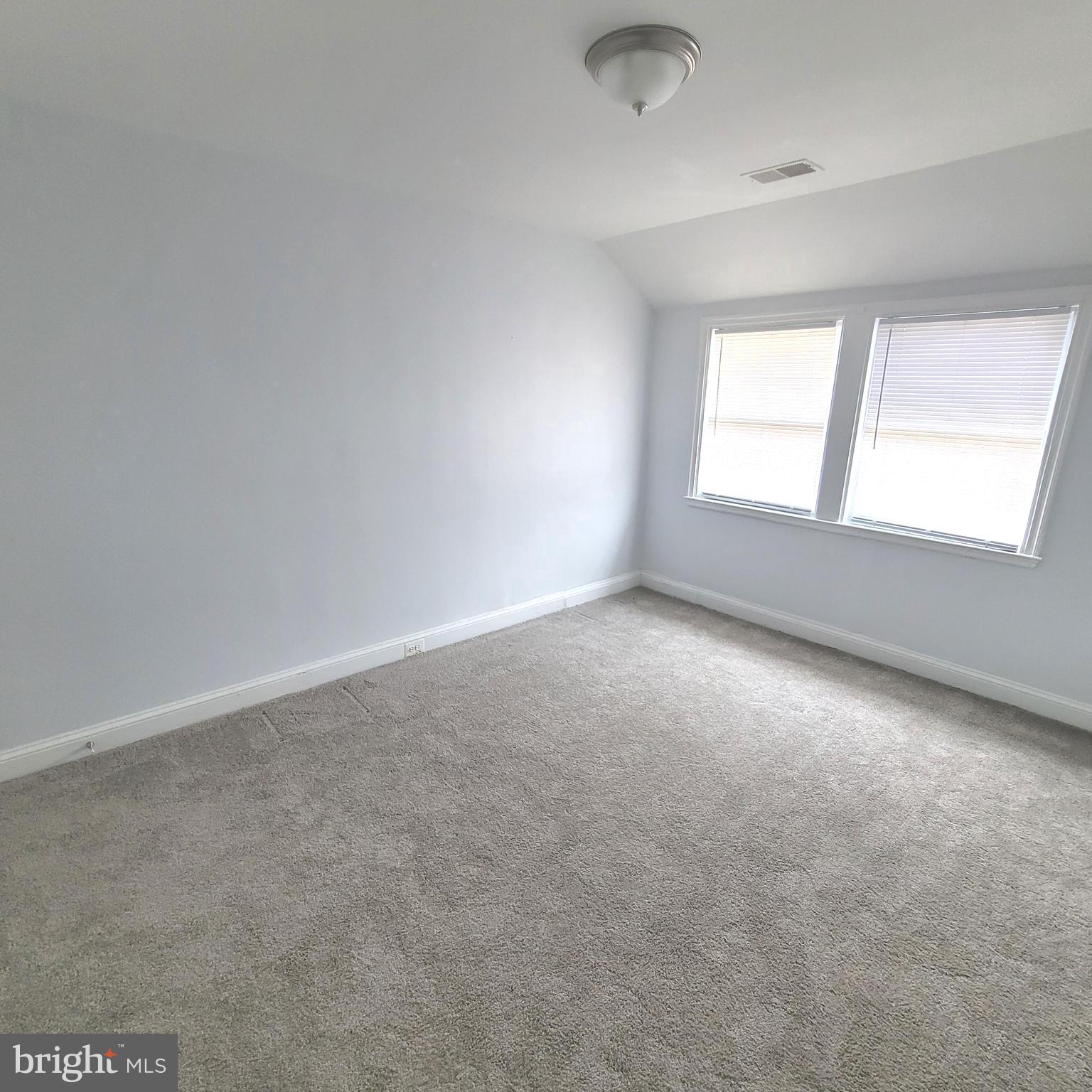 4603 Marble Hall Road Baltimore, MD 21239 - Photo 11 of 24 an empty room with a window