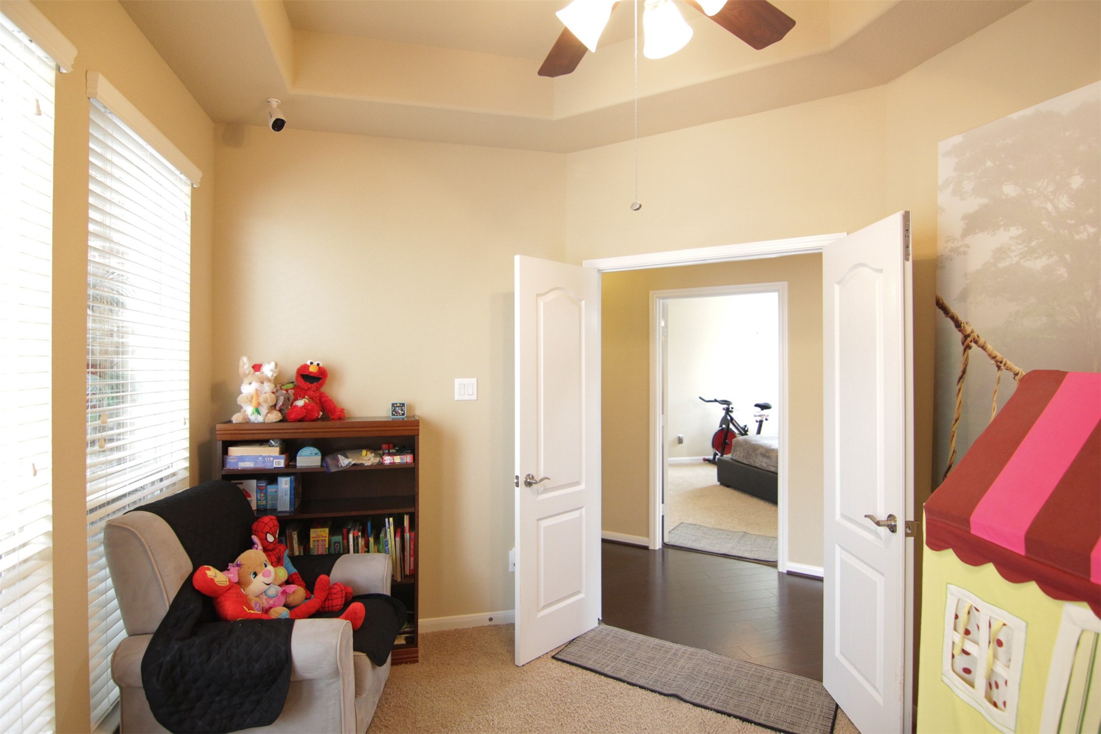 1423 Ralston Branch Way Sugar Land, TX 77479 - Photo 27 of 43 reverse view of secondary bedroom showing French doors, tray ceiling