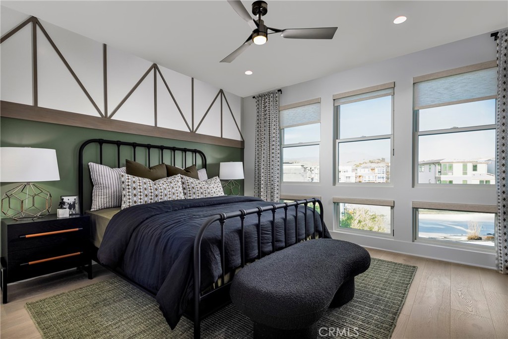 136 Creation Irvine, CA 92618 - Photo 11 of 18 a bed room with a bed window and a couch