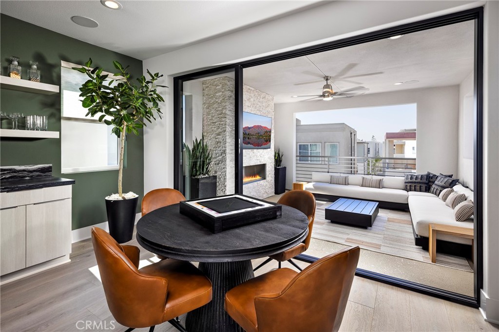 136 Creation Irvine, CA 92618 - Photo 14 of 18 a living room with furniture and a potted plant