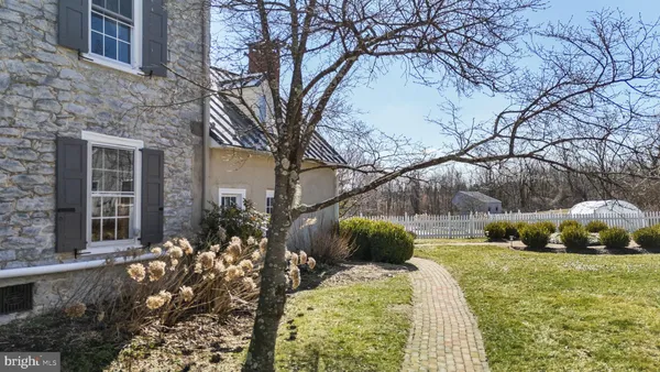 a kitchen with stainless steel appliances granite countertop a refrigerator and a stove