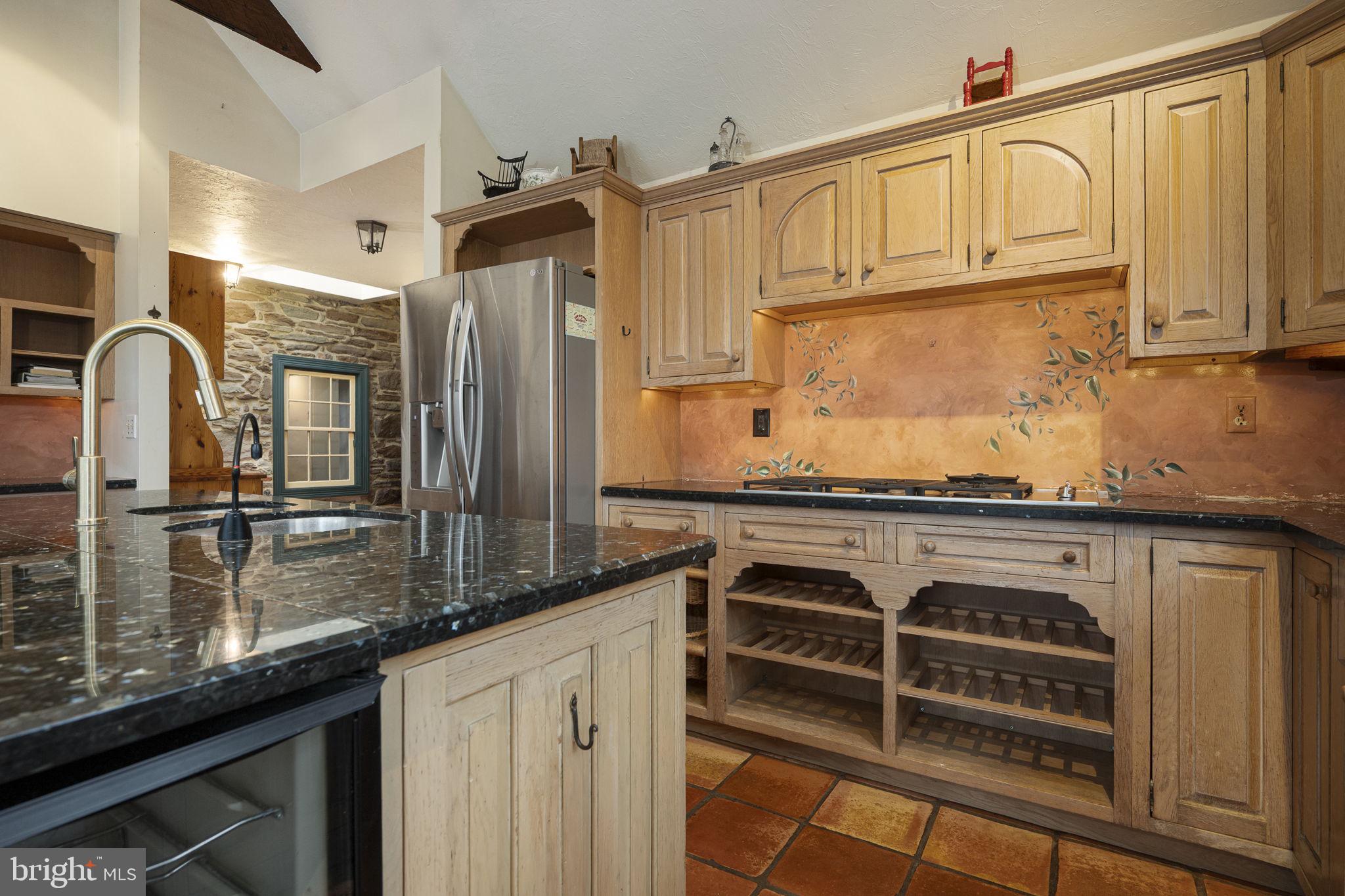 371 Old Tulpehocken Road Birdsboro, PA 19508 - Photo 20 of 99 a kitchen with stainless steel appliances granite countertop a refrigerator and a stove