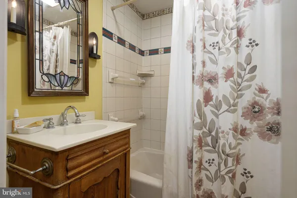 a view of a house with a outdoor space and sitting area