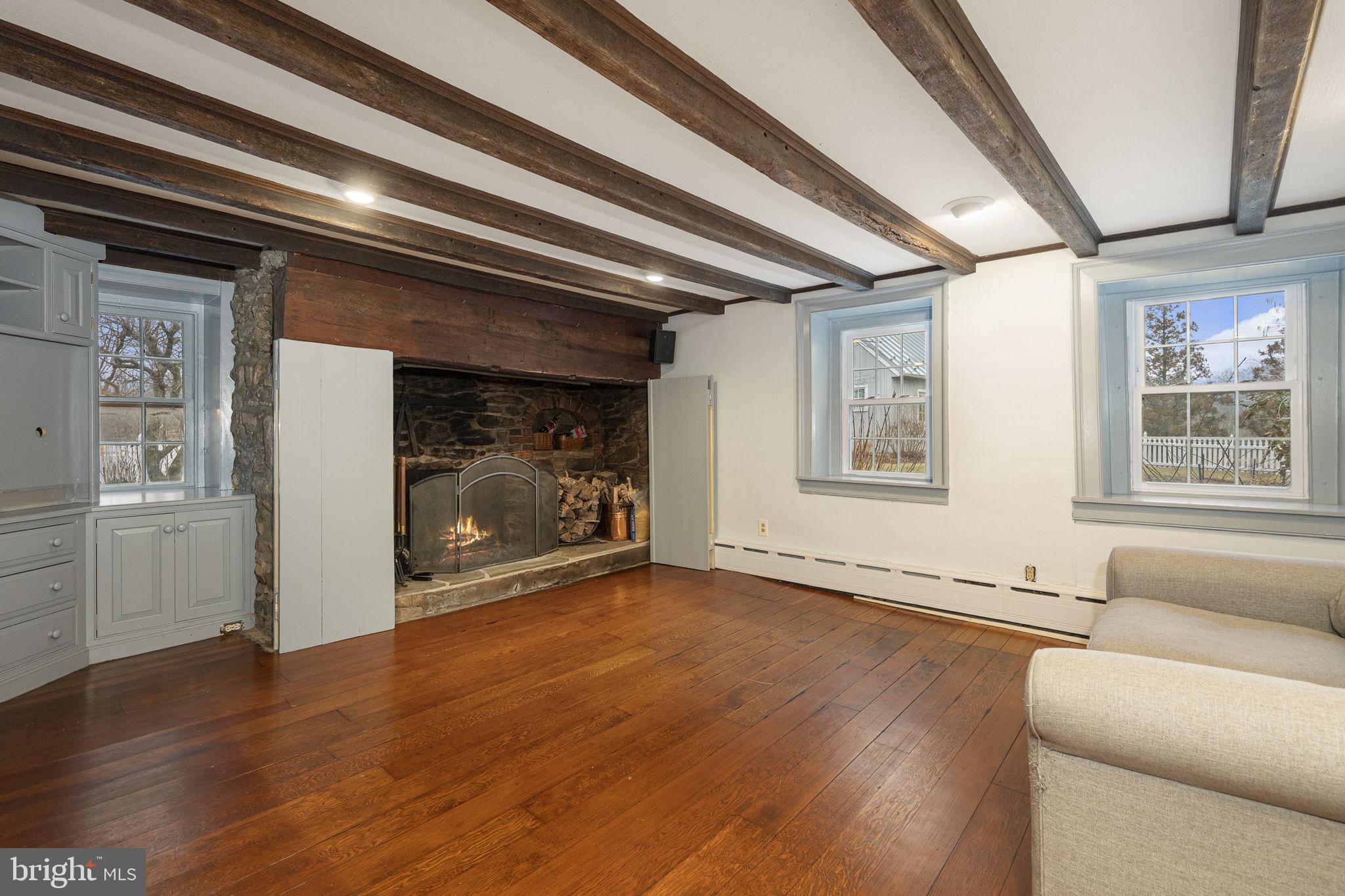 371 Old Tulpehocken Road Birdsboro, PA 19508 - Photo 30 of 99 a view of an empty room with wooden floor and a window