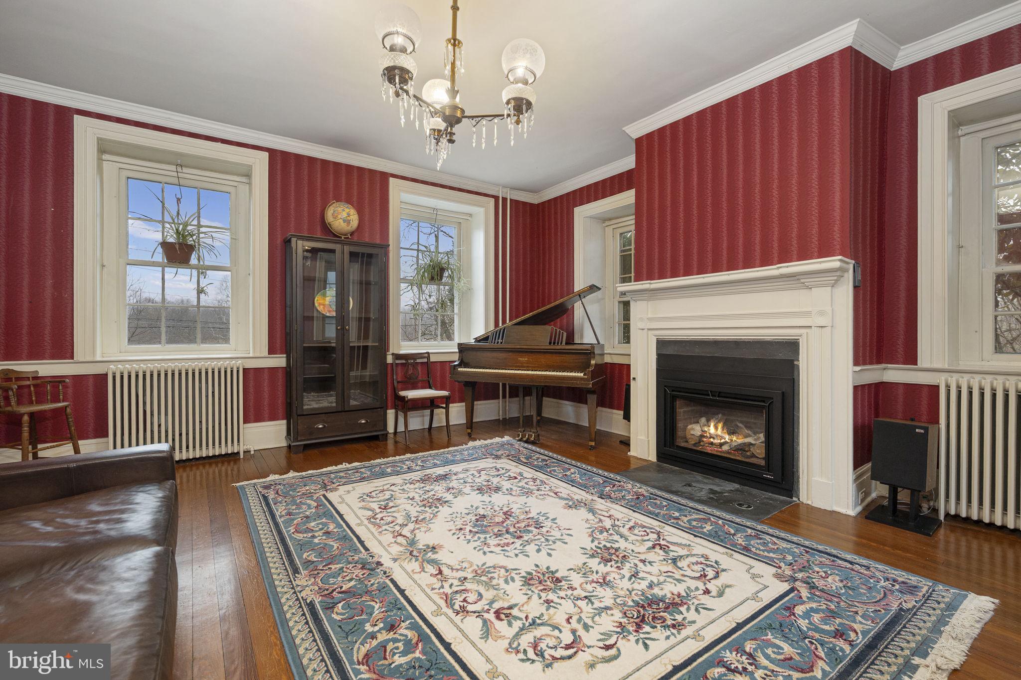 371 Old Tulpehocken Road Birdsboro, PA 19508 - Photo 36 of 99 a living room with furniture and a fireplace