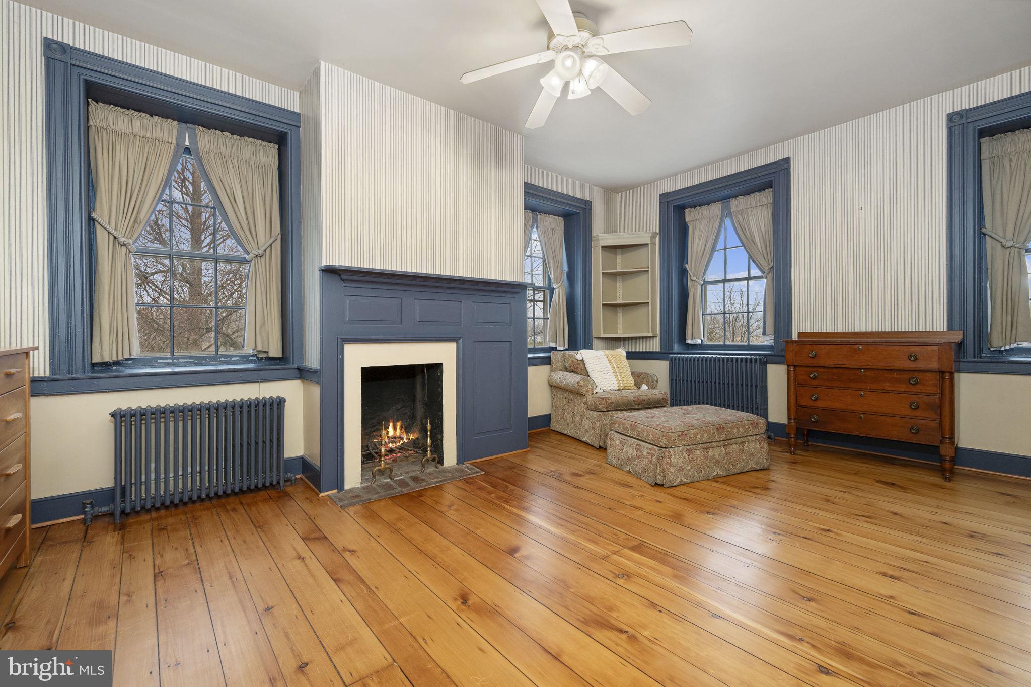 371 Old Tulpehocken Road Birdsboro, PA 19508 - Photo 42 of 99 a living room with furniture and a fireplace