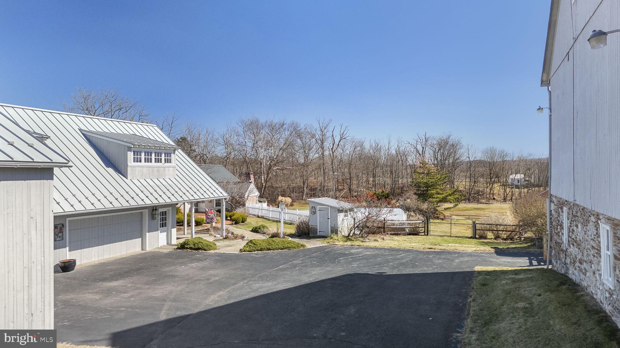371 Old Tulpehocken Road Birdsboro, PA 19508 - Photo 51 of 99 a view of a house with a outdoor space and sitting area