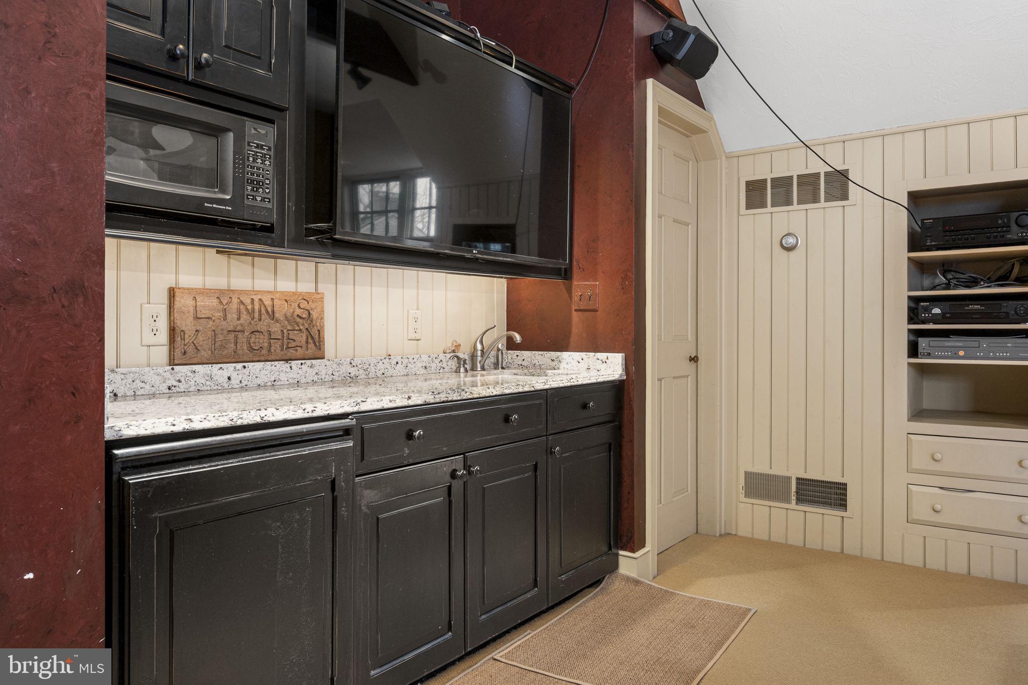 371 Old Tulpehocken Road Birdsboro, PA 19508 - Photo 61 of 99 a kitchen with stainless steel appliances granite countertop a refrigerator and a stove top oven
