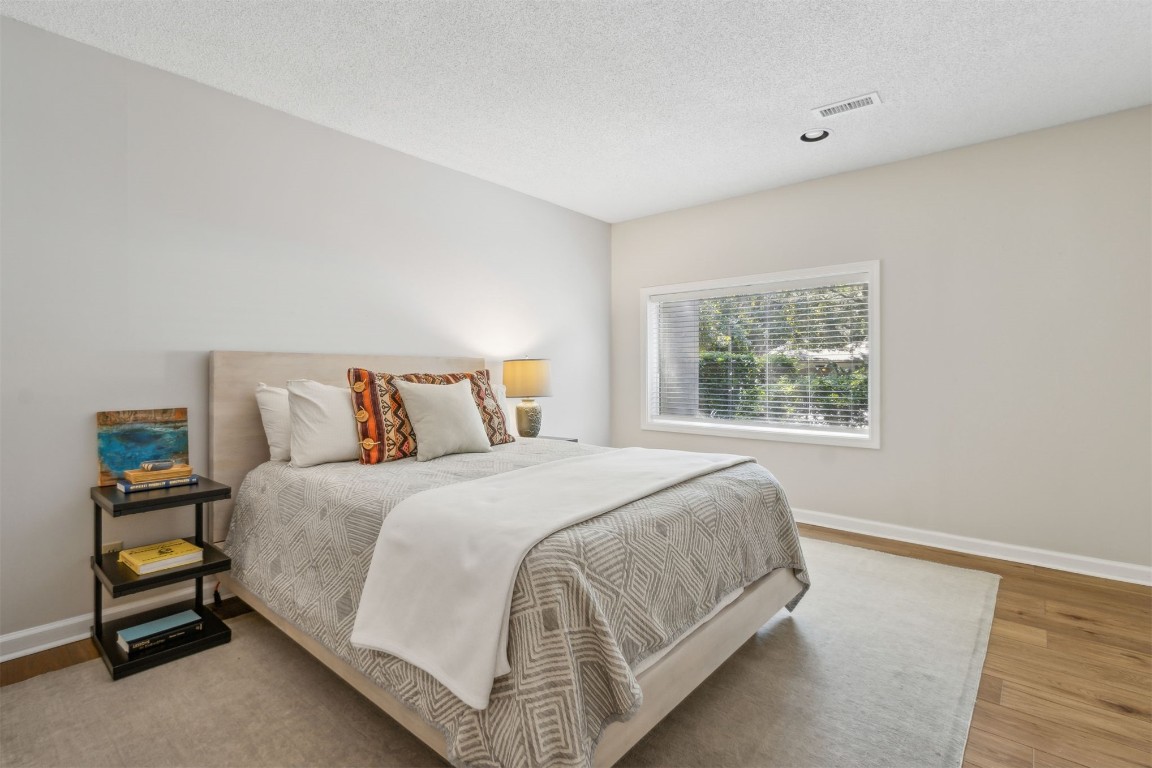 3304 Sea Marsh Road Fernandina Beach, FL 32034 - Photo 17 of 43 a bedroom with a bed and a window