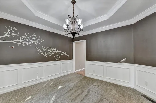 a living room with furniture fireplace and flat screen tv