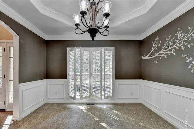 a living room with furniture fireplace and flat screen tv