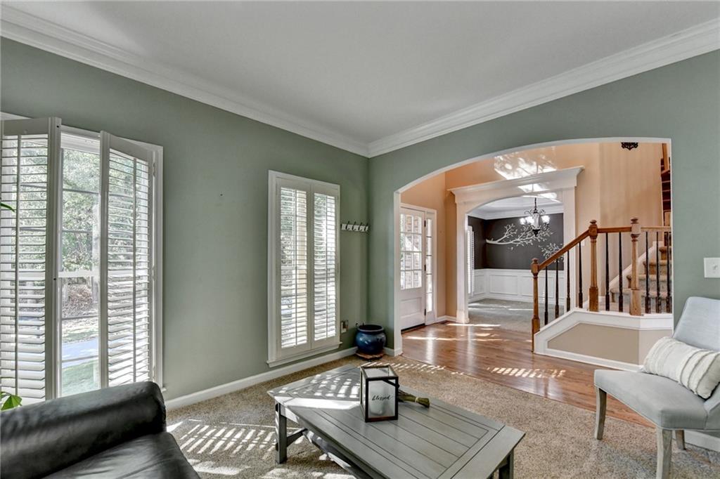 1973 Hamilton Mill Parkway Dacula, GA 30019 - Photo 17 of 105 a living room with furniture and a window