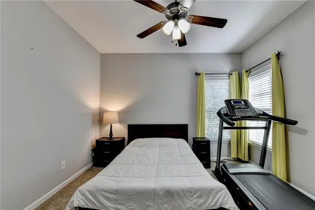 a bedroom with a bed and a walk in closet