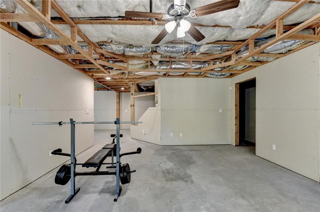 1973 Hamilton Mill Parkway Dacula, GA 30019 - Photo 68 of 105 a view of a room with gym equipment