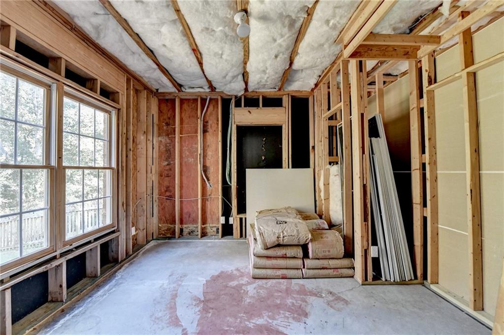 1973 Hamilton Mill Parkway Dacula, GA 30019 - Photo 69 of 105 a living room with furniture and a window